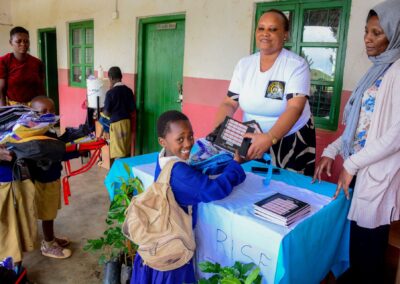 Rose Rise Personnel Offering Scholastic Materials and Tree Seedlings for an Afforestation Project in Schools 10
