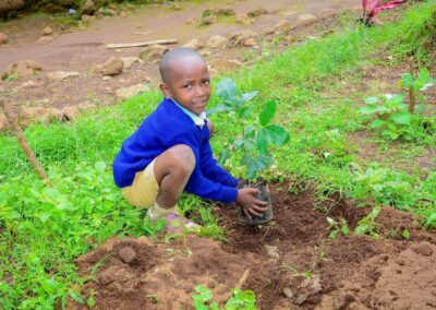 Rose Rise Personnel Offering Scholastic Materials and Tree Seedlings for an Afforestation Project in Schools 14
