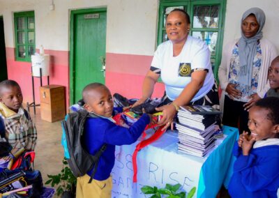 Rose Rise Personnel Offering Scholastic Materials and Tree Seedlings for an Afforestation Project in Schools 5